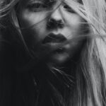 grayscale photography of woman's face